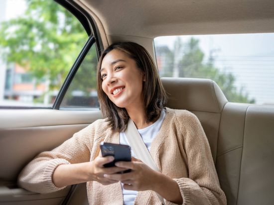 Generic_Girl_in_Car_Transfer_shutterstock_2319433401