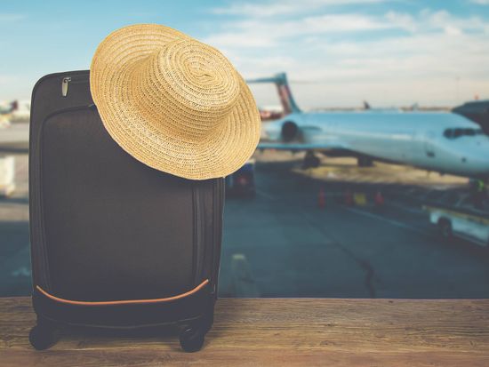 Airport_Suitcase_Luggage_Airplane_Summer_Transportation_shutterstock_590220761