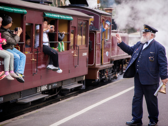 Train departing Belgrave