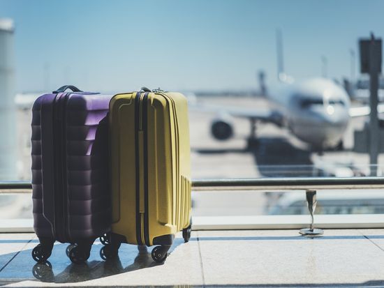 Airport_Terminal_Suitcase_Travel_Airplane_shutterstock_450980248