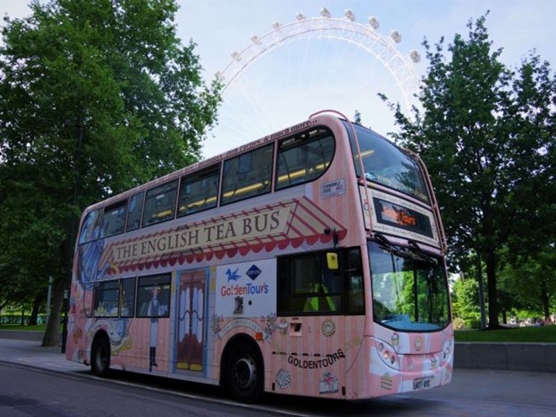 Side of Afternoon Tea Bus in front of London Eye