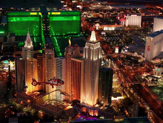 RS14069_Red-Heli-Flying-Over-Las-Vegas-Strip-At-Night