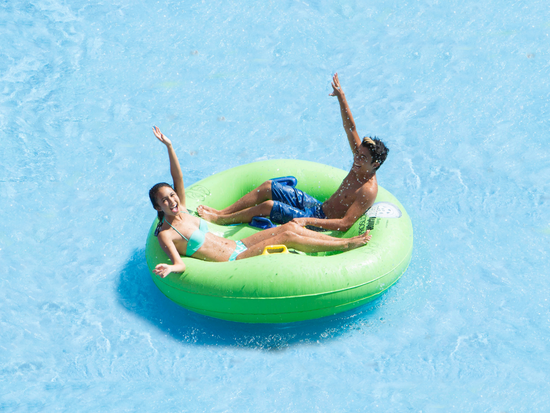 Happy teens at the swimming pool