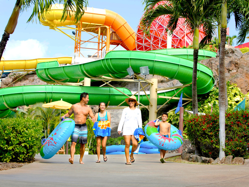 Happy family ready to enjoy at the Wet n Wild Waterpark