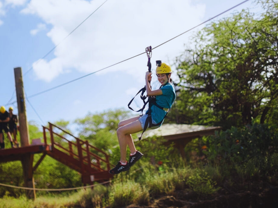 Zip through the lush greenery at Coral Crater
