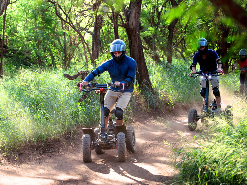 Tackle rugged trails filled with twists, turns, obstacles, and berms at Coral Crater Adventure Park