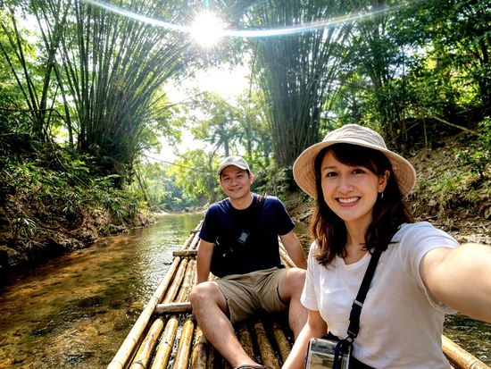Hop on a bamboo raft with a local boatman.