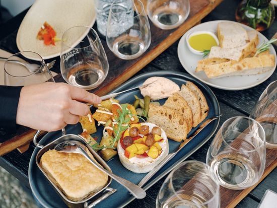 Carrick lunch platter close up food hands - Appellation Wine Tours
